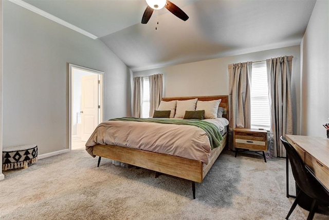 bedroom featuring light carpet, vaulted ceiling, multiple windows, and ceiling fan