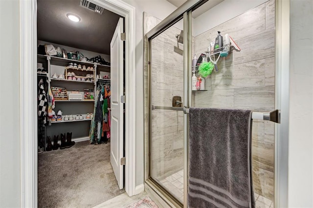 bathroom with an enclosed shower