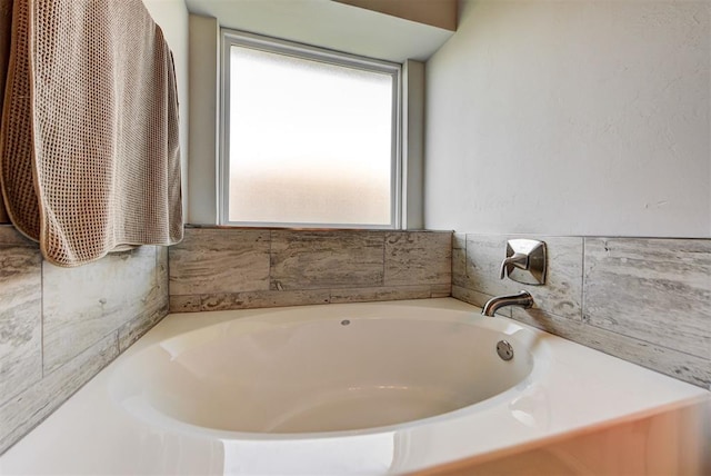 bathroom with a bathing tub