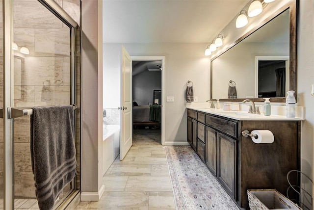 bathroom with plus walk in shower and vanity