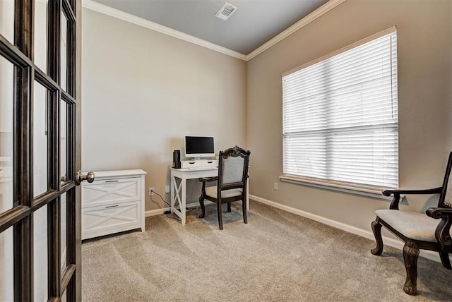 office space featuring light colored carpet, a healthy amount of sunlight, and ornamental molding