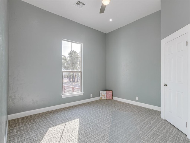 empty room featuring ceiling fan