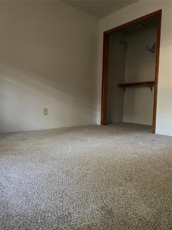 unfurnished bedroom featuring a closet