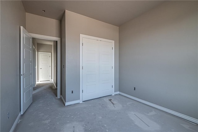 unfurnished bedroom with a closet