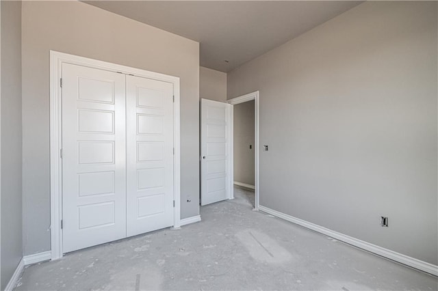 unfurnished bedroom with a closet