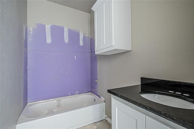 bathroom featuring a bathtub and vanity