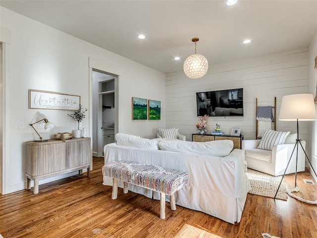 bedroom with hardwood / wood-style floors