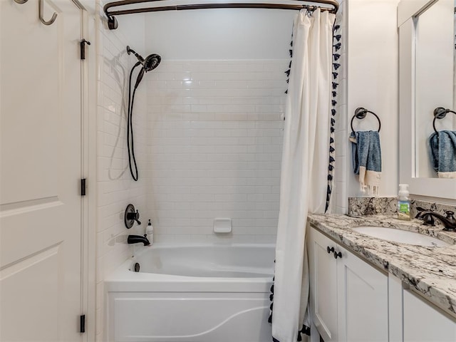 bathroom featuring shower / bath combination with curtain and vanity