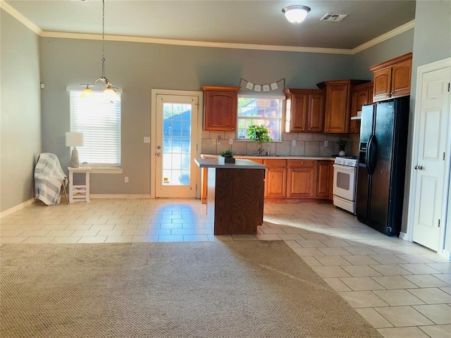 kitchen featuring light tile patterned floors, tasteful backsplash, black refrigerator with ice dispenser, a kitchen island, and white gas range oven