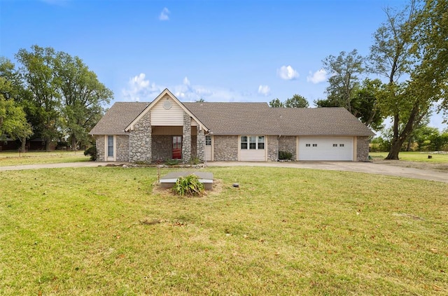 view of front facade with a front yard and a garage