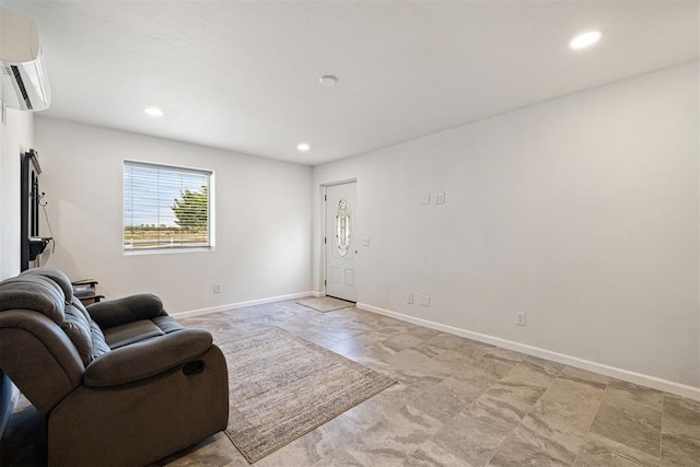 living room featuring an AC wall unit