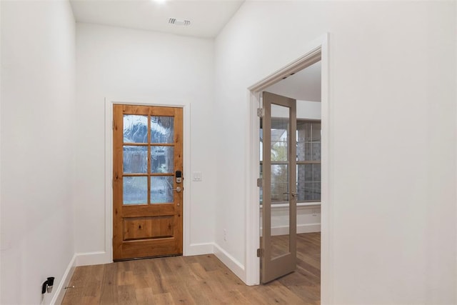 entrance foyer featuring light hardwood / wood-style floors