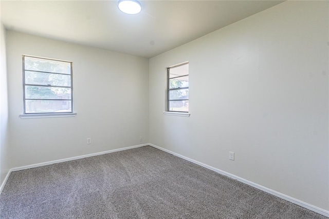 3201 Longridge Rd, Del City, OK 73115 - spare room with carpet floors and baseboards