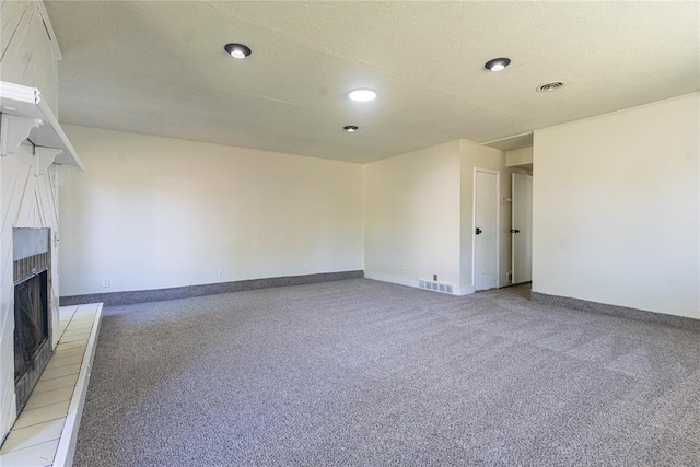 3201 Longridge Rd, Del City, OK 73115 - unfurnished living room with a brick fireplace, light carpet, and recessed lighting