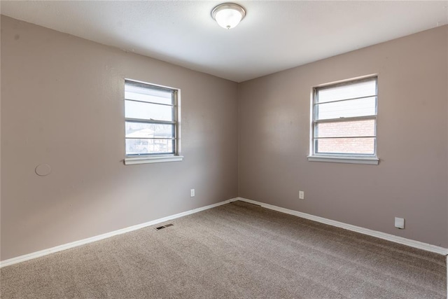 view of carpeted spare room