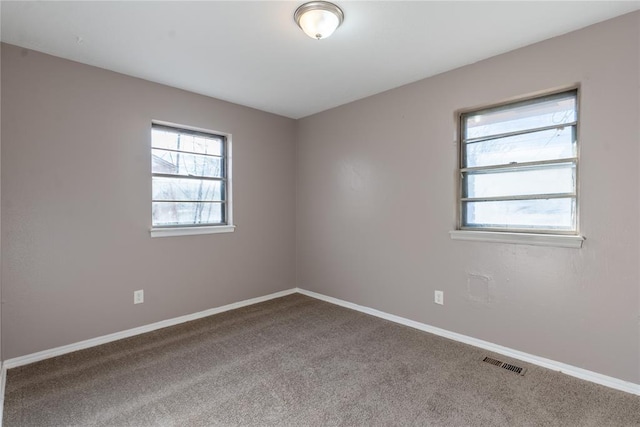 unfurnished room with carpet