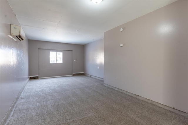 carpeted empty room with a wall mounted AC