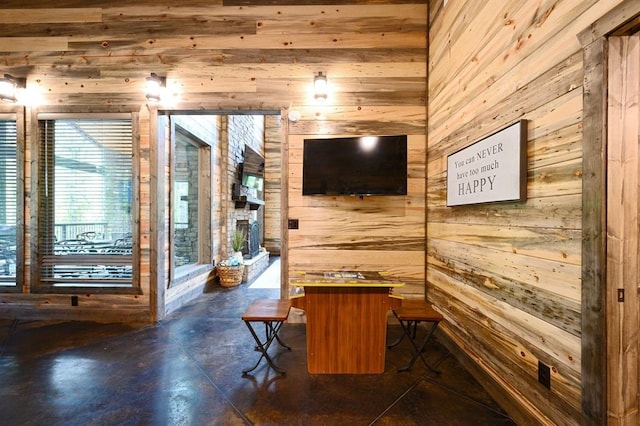 interior space featuring wooden walls