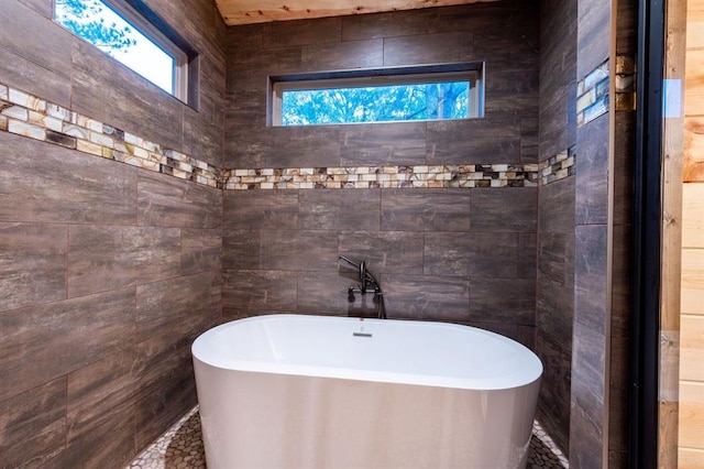 bathroom featuring a tub