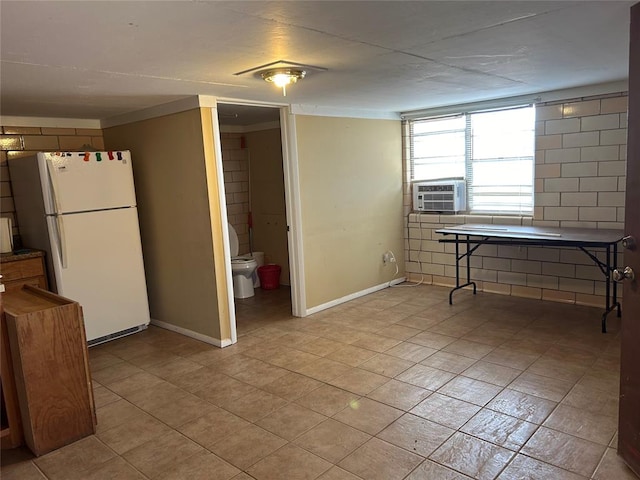 kitchen with cooling unit and white refrigerator