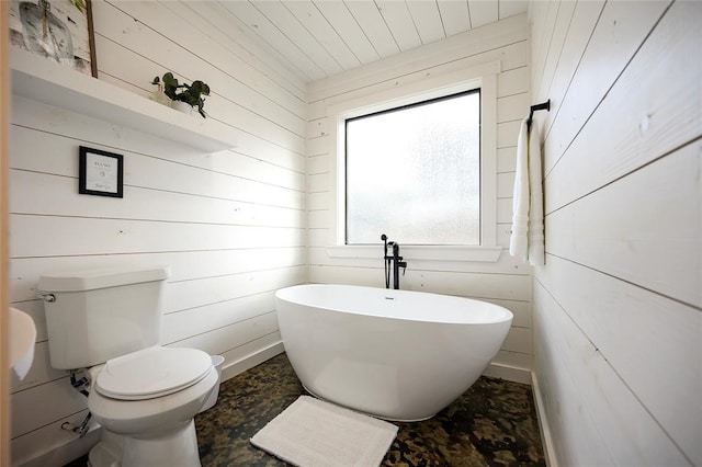 bathroom featuring wood ceiling, toilet, a bathtub, and wood walls