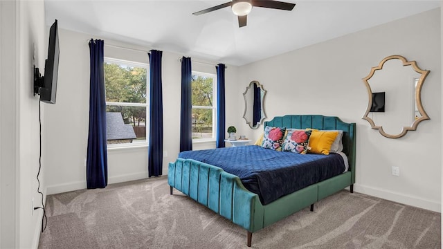 bedroom with light colored carpet and ceiling fan