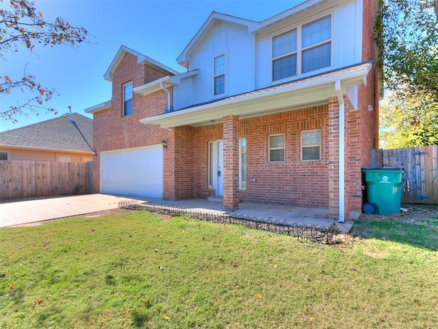 front facade with a garage and a front yard