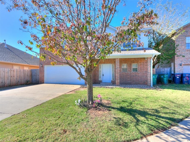 view of front facade featuring a garage and a front yard