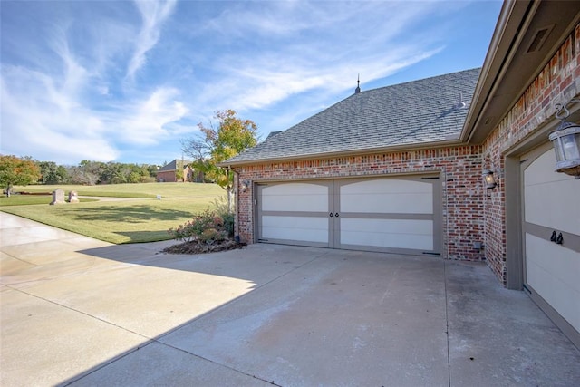 garage with a lawn