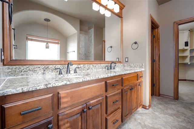 bathroom with tile patterned flooring and vanity