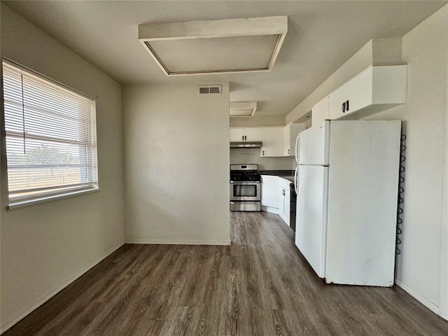 kitchen featuring dishwasher, dark wood-type flooring, stainless steel range with gas cooktop, white fridge, and white cabinets