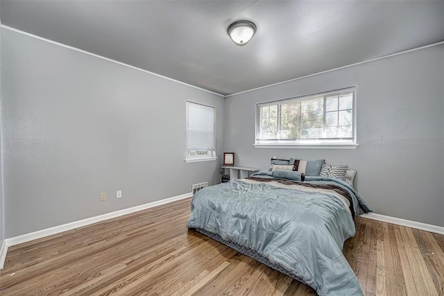 bedroom featuring light wood-type flooring