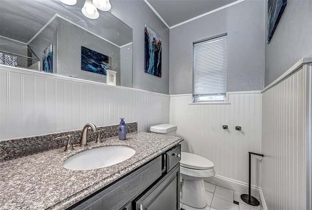 bathroom featuring tile patterned floors, vanity, a shower with shower curtain, and toilet