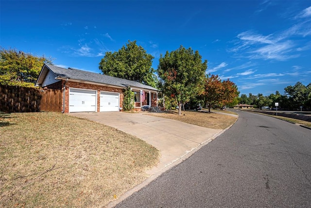 single story home with a garage