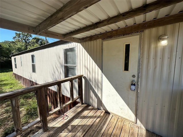 doorway to property with a wooden deck