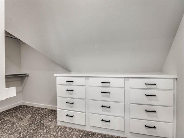 spacious closet with lofted ceiling