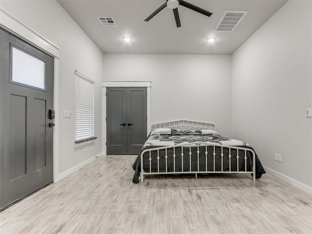 bedroom featuring ceiling fan and light hardwood / wood-style floors