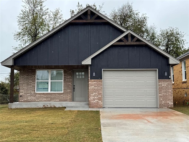 view of front of property with a front yard and a garage