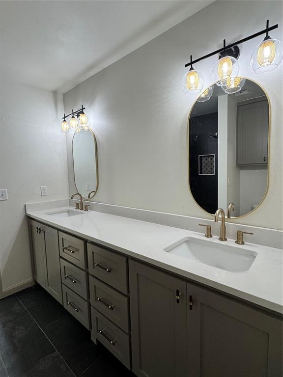 bathroom featuring tile patterned floors and vanity