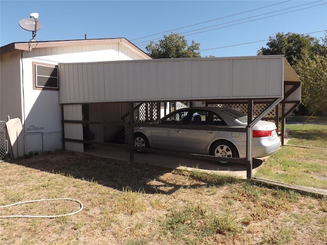 view of parking with a lawn