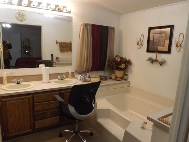 bathroom featuring vanity and a tub to relax in