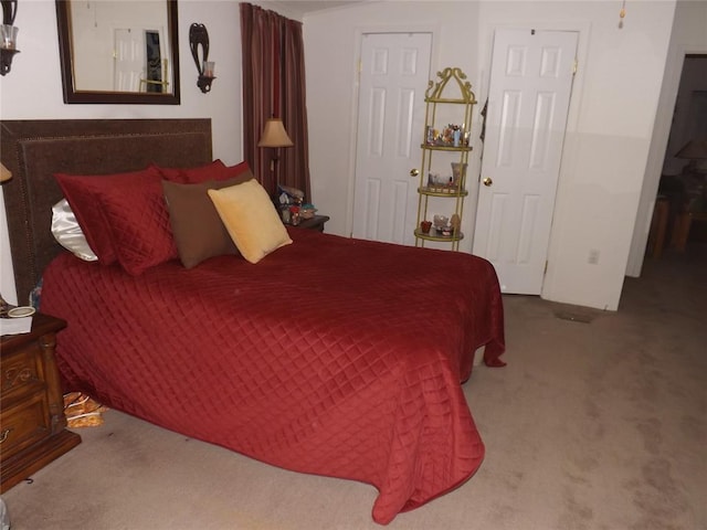 bedroom featuring carpet