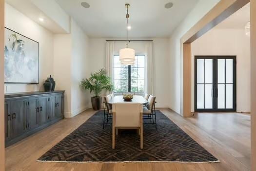 dining room with light wood-type flooring