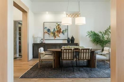 dining space featuring hardwood / wood-style flooring and breakfast area