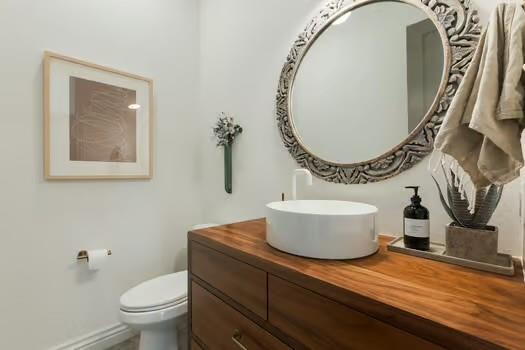 bathroom with vanity and toilet