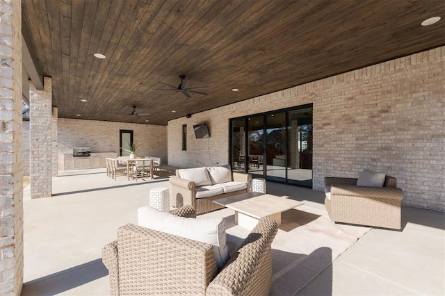 view of patio with an outdoor hangout area and ceiling fan