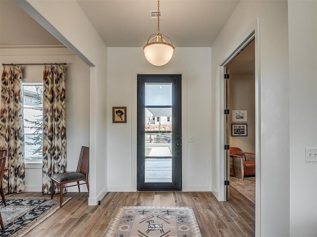 foyer entrance featuring light wood-type flooring