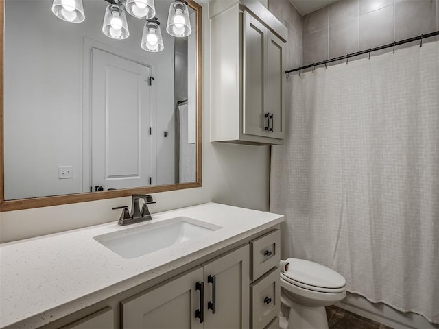 full bathroom with vanity, toilet, and shower / tub combo with curtain