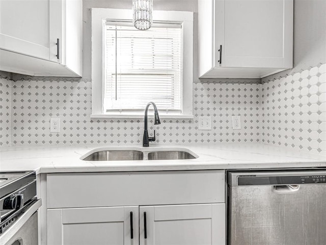 kitchen with dishwasher, white cabinetry, range with electric stovetop, and sink