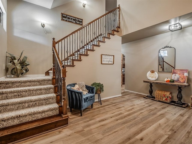 stairs with wood-type flooring